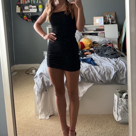 Tight, Black, Mini Windsor hoco dress. Sinched by the butt. Thin straps. Size S. - Picture 1 of 4